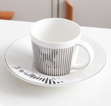 Carvallo - rörlig spegelreflektion av kreativa kaffekoppar Carvallo