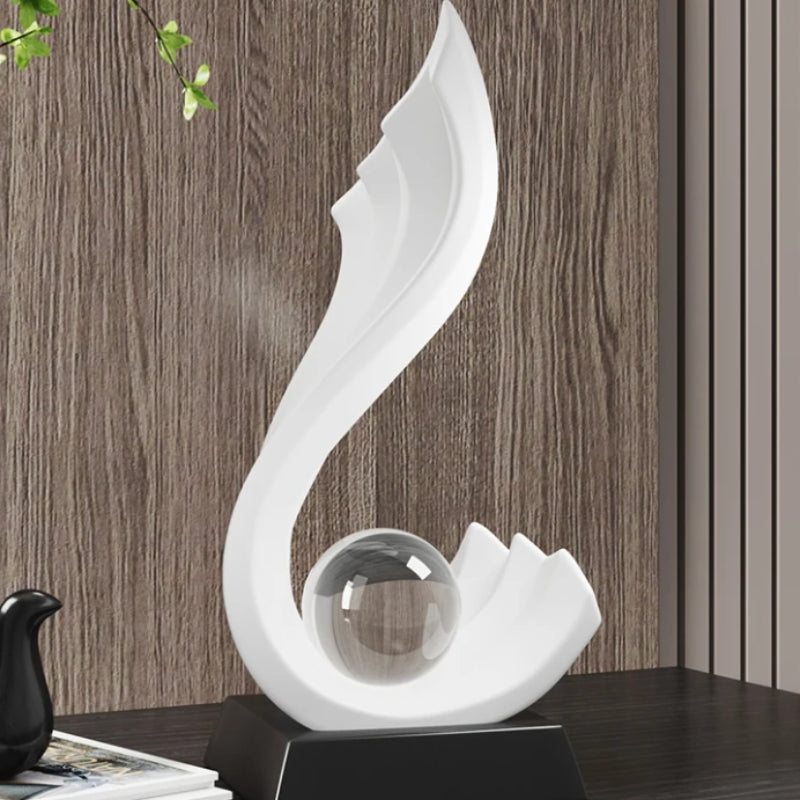 Orbelle – Konstnärlig abstrakt skulptur med kristallklar kula och elegant form Carvallo