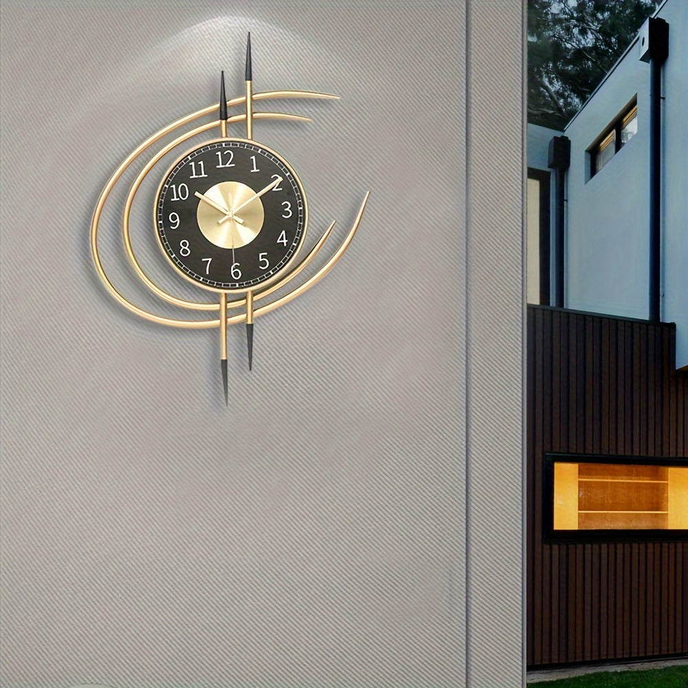 Carvallo – Tyst, konstnärlig väggklocka med skulpturell design i svart och guld Carvallo