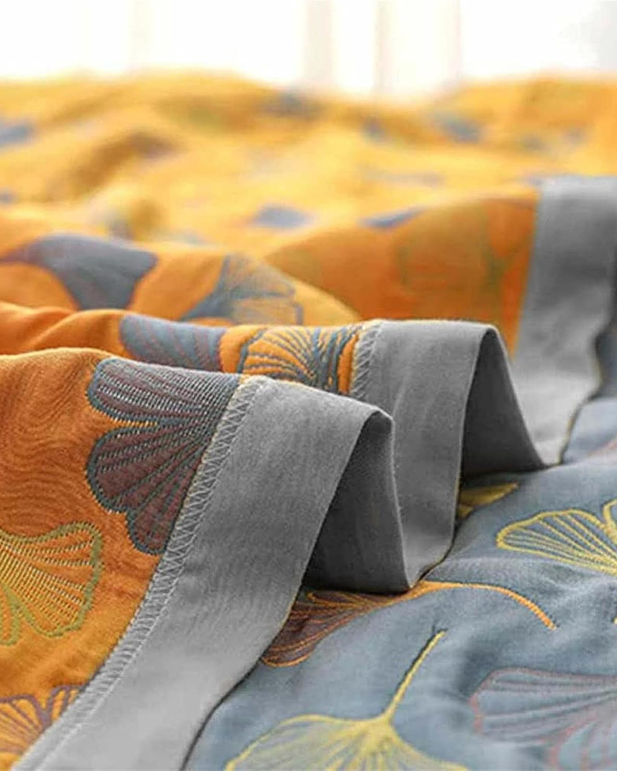 Carvallo – Lyxig bomullsfilt med fint lövmönster för värme och stil Carvallo