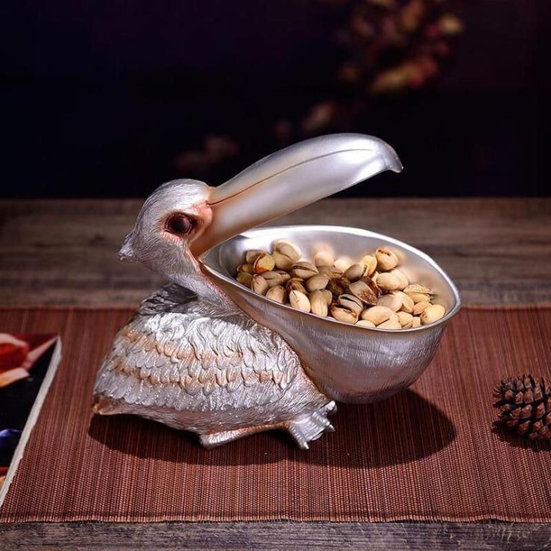 Topika – Skulpterad pelikankorg i harts MILA Sverige