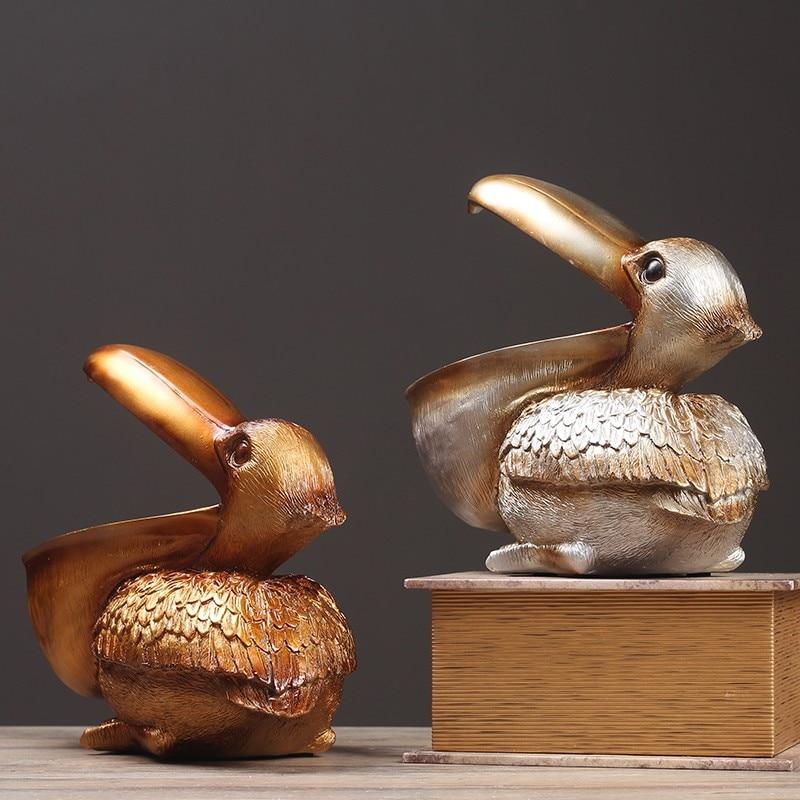 Topika – Skulpterad pelikankorg i harts MILA Sverige