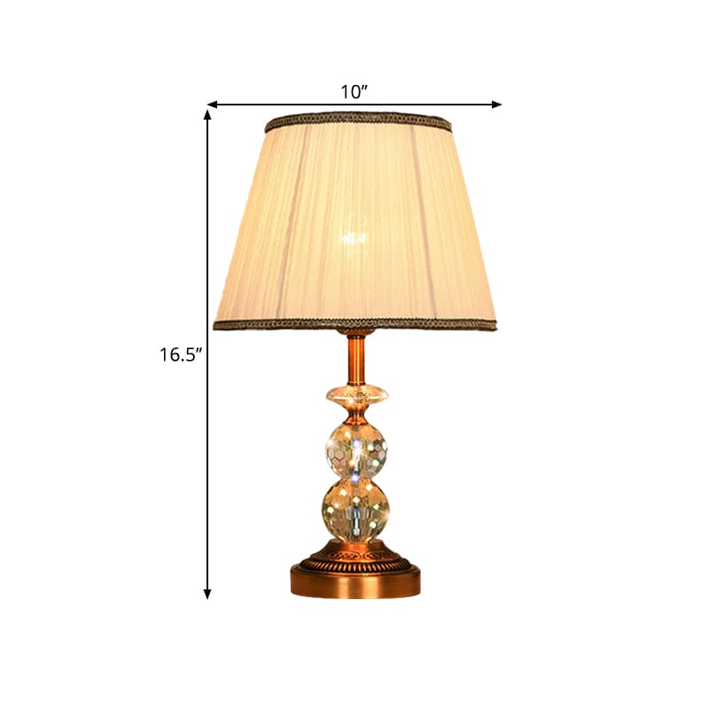 Kristallbordslampa med konisk form och slipade kristallkulor Carvallo