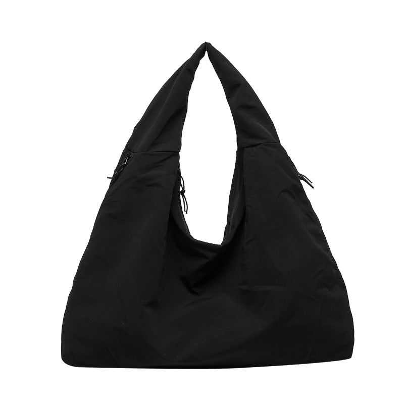 Praktisk och stilfull dam multifunktionshandväska Carvallo