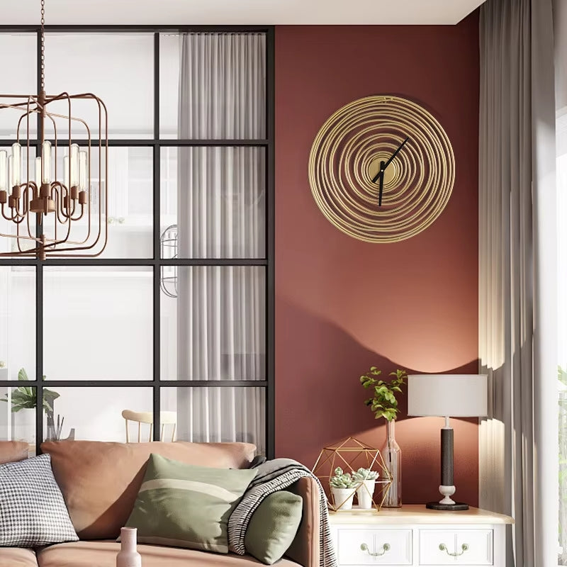 Carvallo - Klassisk gyllene väggur för elegant heminredning Carvallo