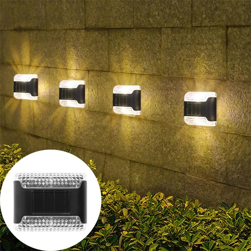 Carvallo Solar-vägglampa i 4-pack | Rörelsesensitiv | IP65 Vattenskydd | Varmvitt LED-ljus Carvallo