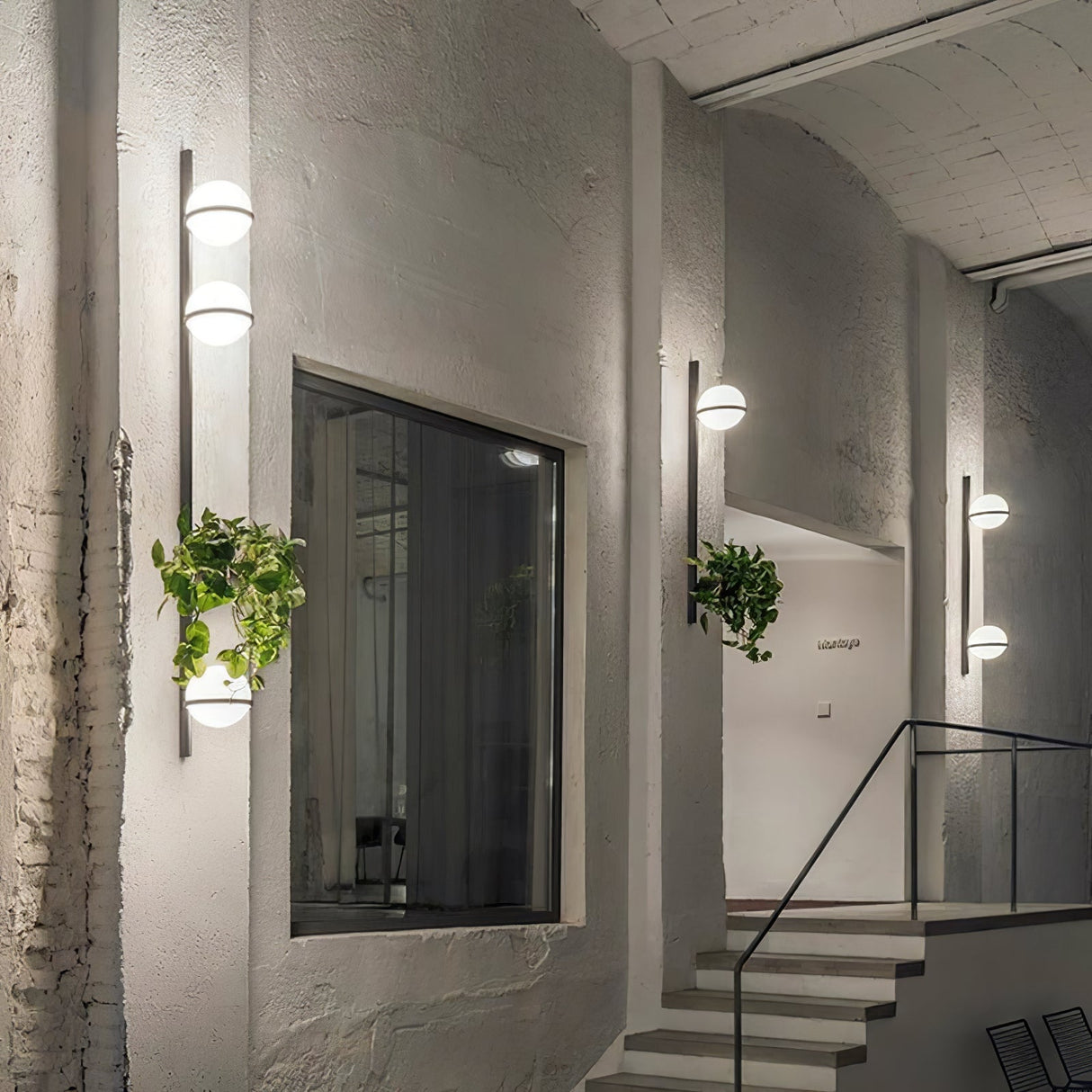 Snygg globformad utomhusvägglampa Carvallo