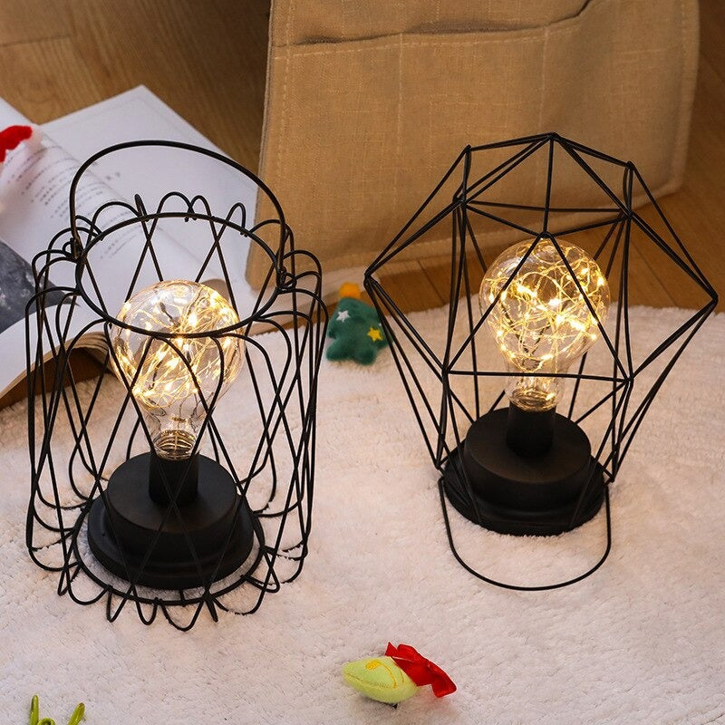 Industriell batteridriven sänglampa med färgglada pärlor Carvallo