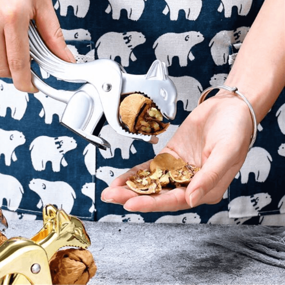 NutSnap - Bärbar nötknäckare med lätt tryckhandtag Carvallo