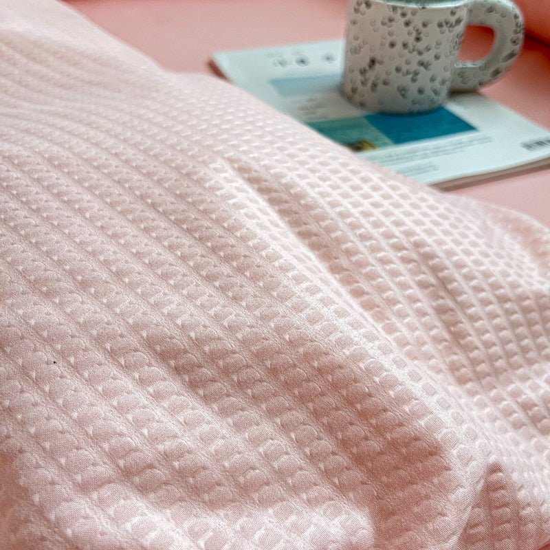 Enkelpastellfärgad sängklädset Carvallo