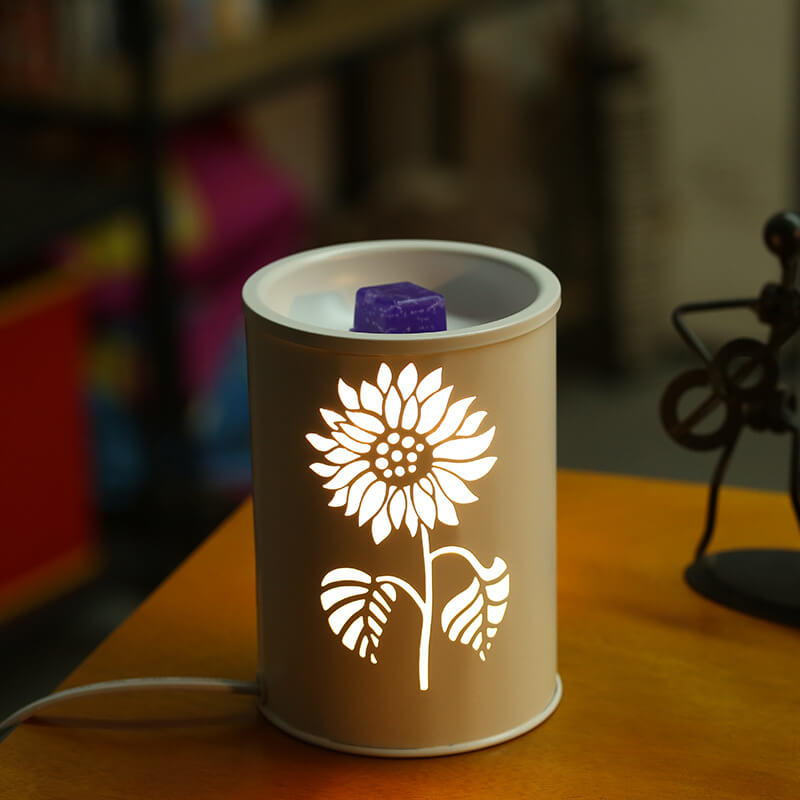 Modern cylindrisk vaxlampa – blommönster med aromaterapiglöd Save translation MILA Sverige