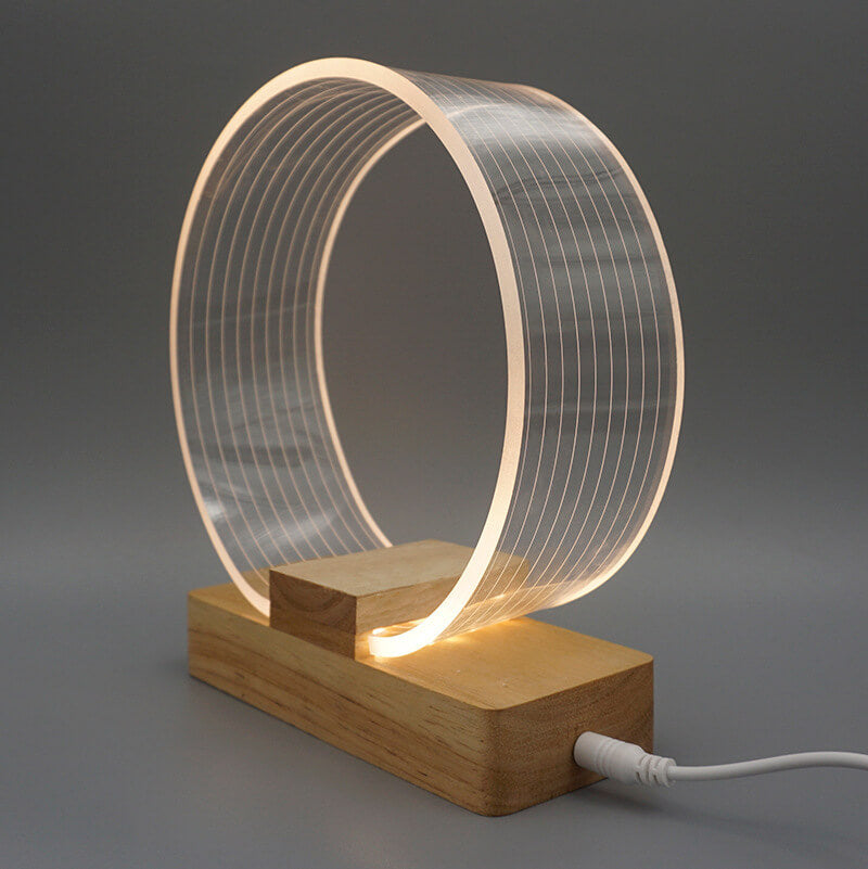 Nordic Minimalist Ringlampa – Genomskinlig akryl med träfot MILA Sverige