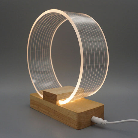 Nordic Minimalist Ringlampa – Genomskinlig akryl med träfot MILA Sverige