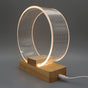 Nordic Minimalist Ringlampa – Genomskinlig akryl med träfot MILA Sverige