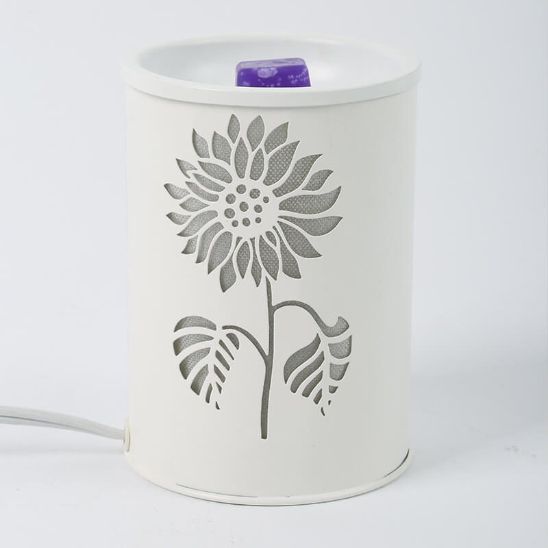 Modern cylindrisk vaxlampa – blommönster med aromaterapiglöd Save translation MILA Sverige