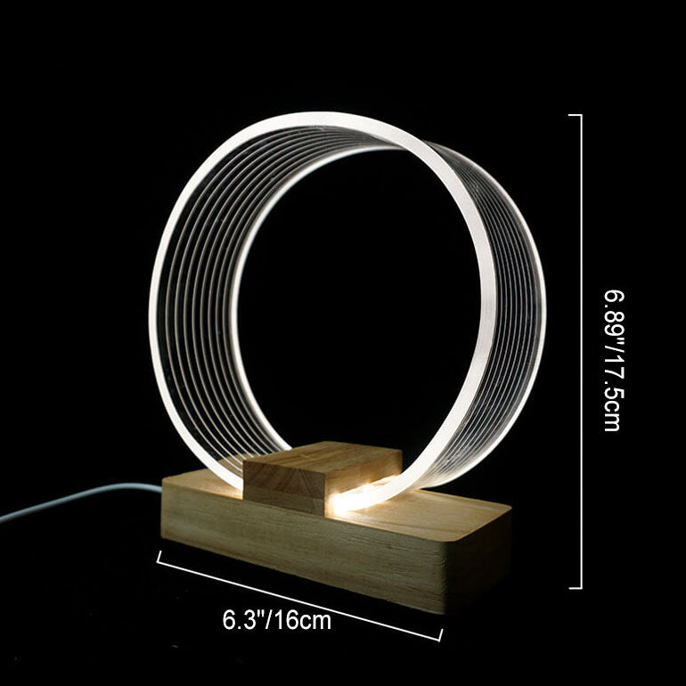 Nordic Minimalist Ringlampa – Genomskinlig akryl med träfot MILA Sverige