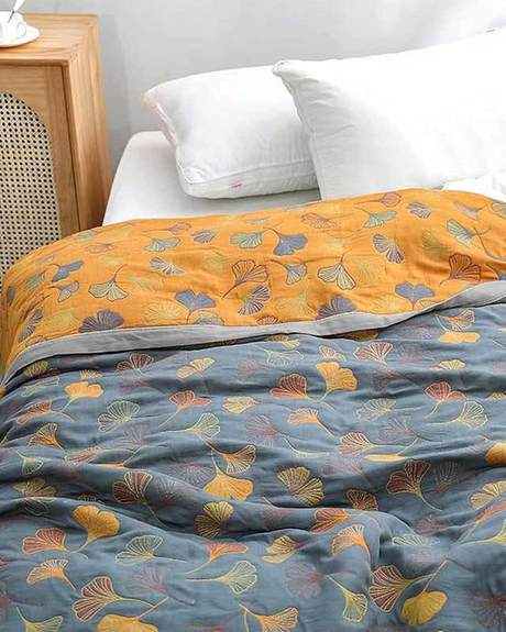 Carvallo – Lyxig bomullsfilt med fint lövmönster för värme och stil Carvallo