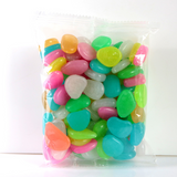 Lysande stenar för trädgård & dekoration – Fosforescerande småstenar i olika färger Carvallo