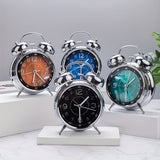 Klassisk metall klocka med klocktopp för punktliga väckningar Carvallo