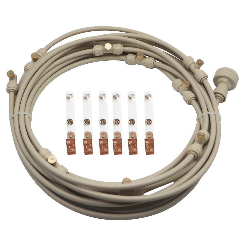 Sprinklersystem – Vattenslang med sprutmunstycken för svalkande uppfriskning i trädgården Carvallo