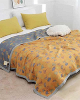 Carvallo – Lyxig bomullsfilt med fint lövmönster för värme och stil Carvallo