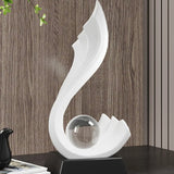 Orbelle – Konstnärlig abstrakt skulptur med kristallklar kula och elegant form Carvallo