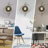 Carvallo – Tyst, konstnärlig väggklocka med skulpturell design i svart och guld Carvallo