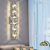 NovaGlow – Modern skiktad vägglampa med reflekterande yta detaljer Carvallo