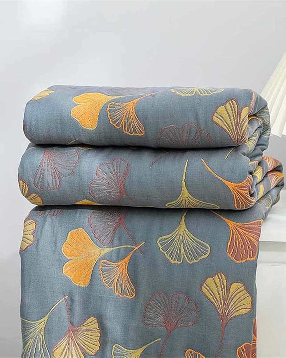 Carvallo – Lyxig bomullsfilt med fint lövmönster för värme och stil Carvallo