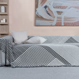 Svart Geometrisk Vändbar Sofföverdrag - Modern, Stilig & Hållbart Sofformskydd Carvallo