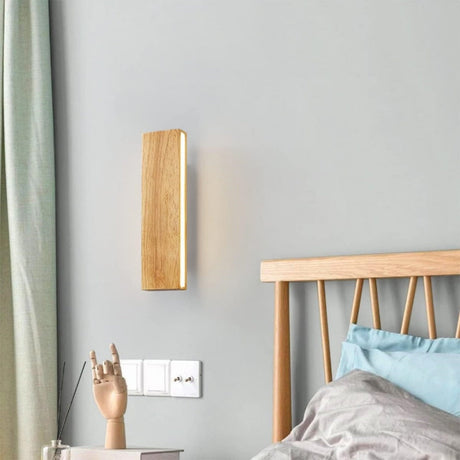 Vägglampa med roterbar trä-LED-design Carvallo