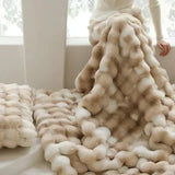 Kuchelige Konstfleece-Koschdecke Carvallo