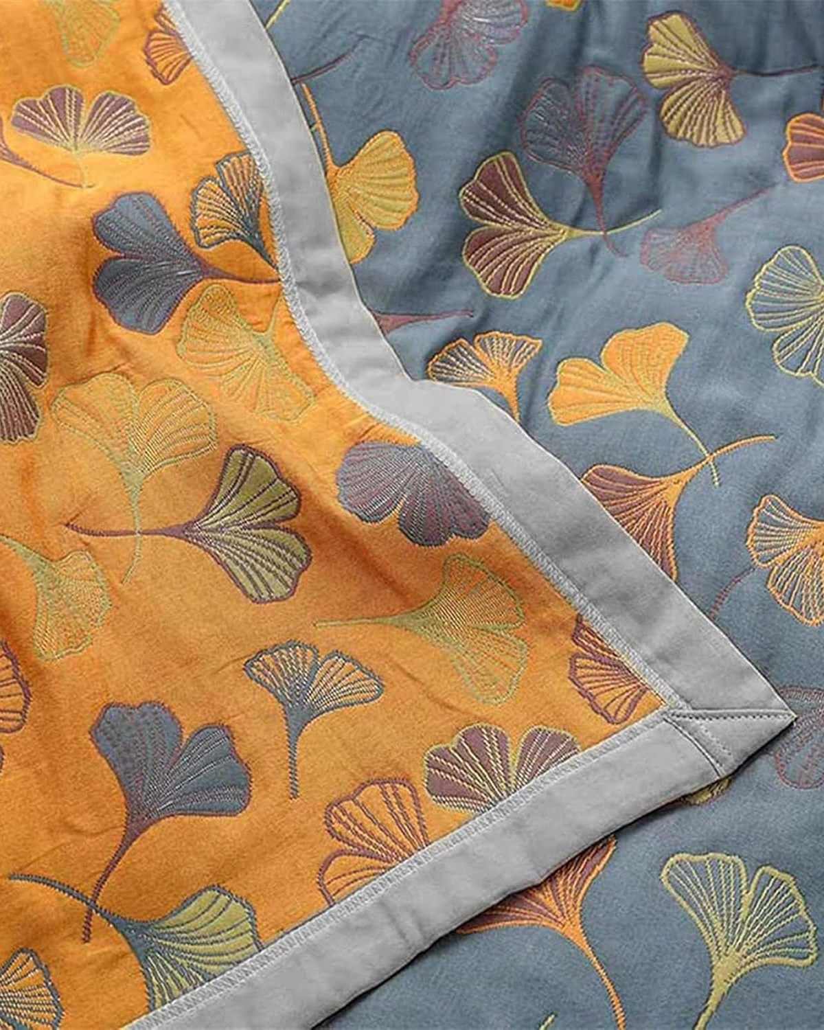 Carvallo – Lyxig bomullsfilt med fint lövmönster för värme och stil Carvallo