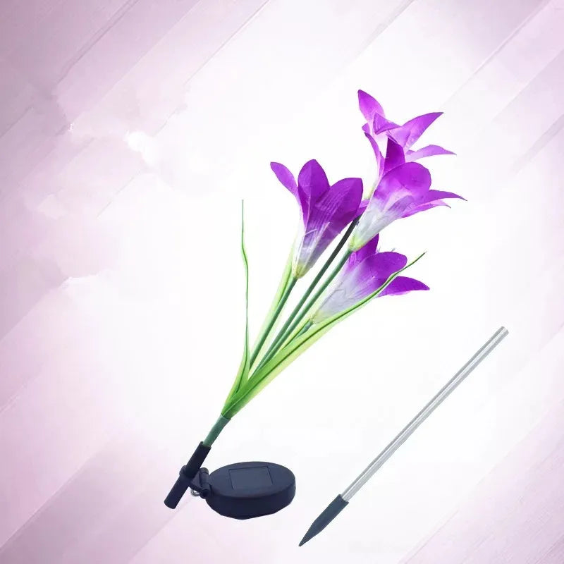 Solenergi LED blommor i liljeform – färgväxlande trädgårdslampor med spjut för utomhusbruk Carvallo