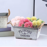 Dekorativ blomster- och trädgårdsbehållare i metall med hampasnörehandtag Carvallo