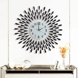 RayBloom – Elegant väggklocka med strålande form och ljudlös urverk Carvallo