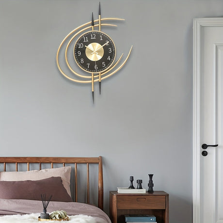 Carvallo – Tyst, konstnärlig väggklocka med skulpturell design i svart och guld Carvallo