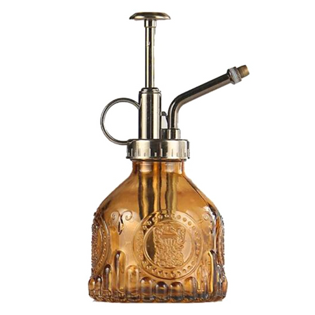 Präglad glasflaska med metallmunstycke – växtspruta för blommabesträckning i vintage-design Carvallo