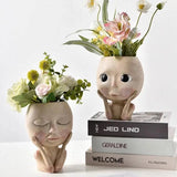 Carvallo – Elegant Resin Plant Pot with Artistic Facial Details Carvallo