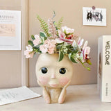 Carvallo – Elegant Resin Plant Pot with Artistic Facial Details Carvallo