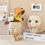 Carvallo – Elegant Resin Plant Pot with Artistic Facial Details Carvallo