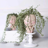 Carvallo – Elegant Resin Plant Pot with Artistic Facial Details Carvallo