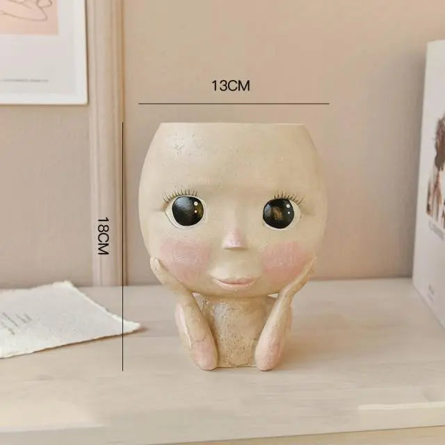 Carvallo – Elegant Resin Plant Pot with Artistic Facial Details Carvallo