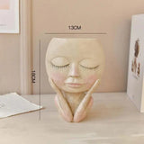 Carvallo – Elegant Resin Plant Pot with Artistic Facial Details Carvallo
