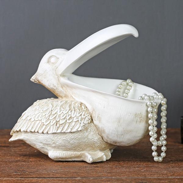 Topika – Skulpterad pelikankorg i harts MILA Sverige