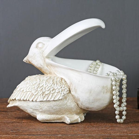 Topika – Skulpterad pelikankorg i harts MILA Sverige