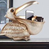 Topika – Skulpterad pelikankorg i harts MILA Sverige