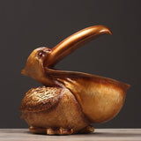 Topika – Skulpterad pelikankorg i harts MILA Sverige