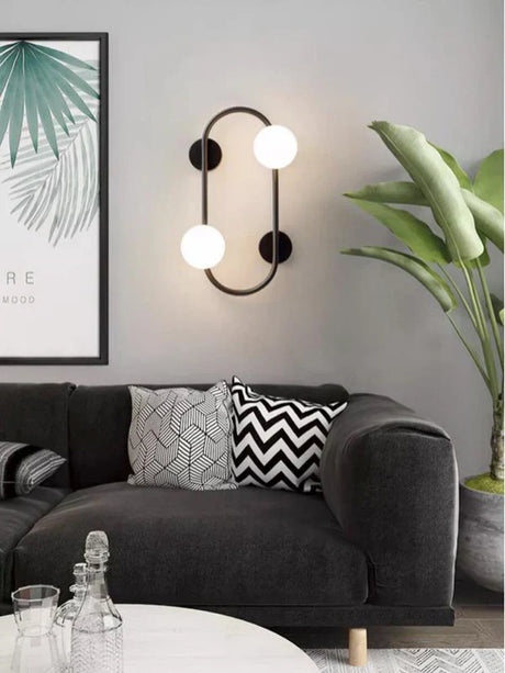 LuminoSphere - Modern mässingsvägglampa med glasbollar Carvallo