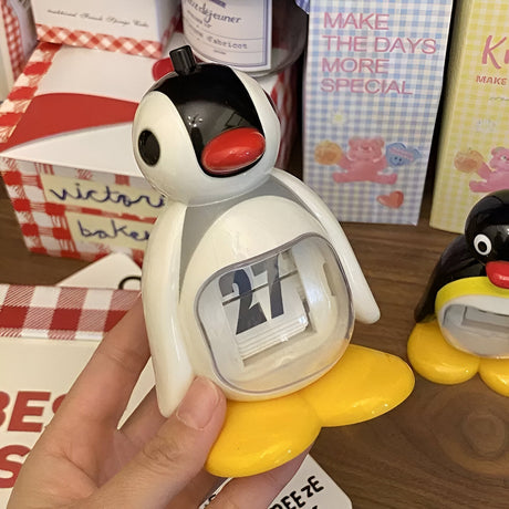PenguinTidy - Manuellt flip leksak med sött pingvindesign Carvallo
